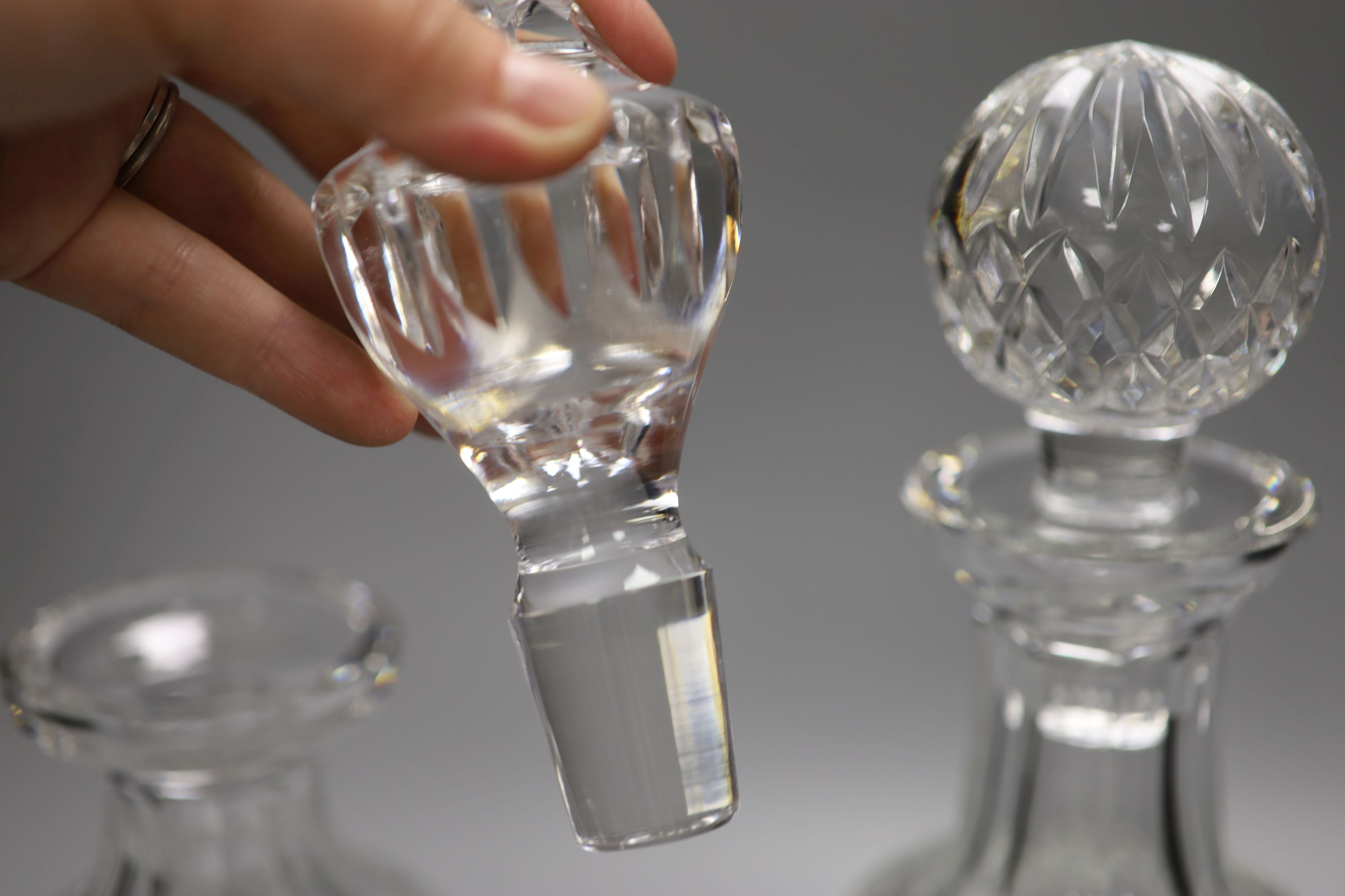 Two Waterford crystal decanters and stoppers, height 30cm